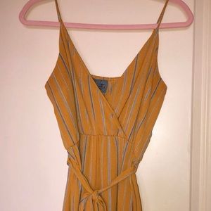 Mustard striped jumpsuit. Bought from boutique. Worn once.
